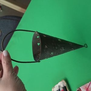 Vintage pierced metal hanging flower cone